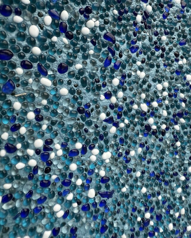 Glass bead pool plaster close-up — shimmering glass bead aggregate finish by Phenomenal Pool & Landscape