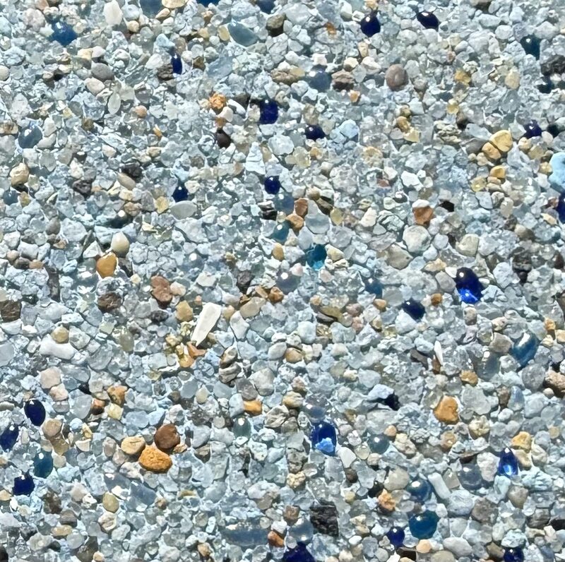 Micro pebble pool plaster close-up — fine pebble aggregate finish by Phenomenal Pool & Landscape