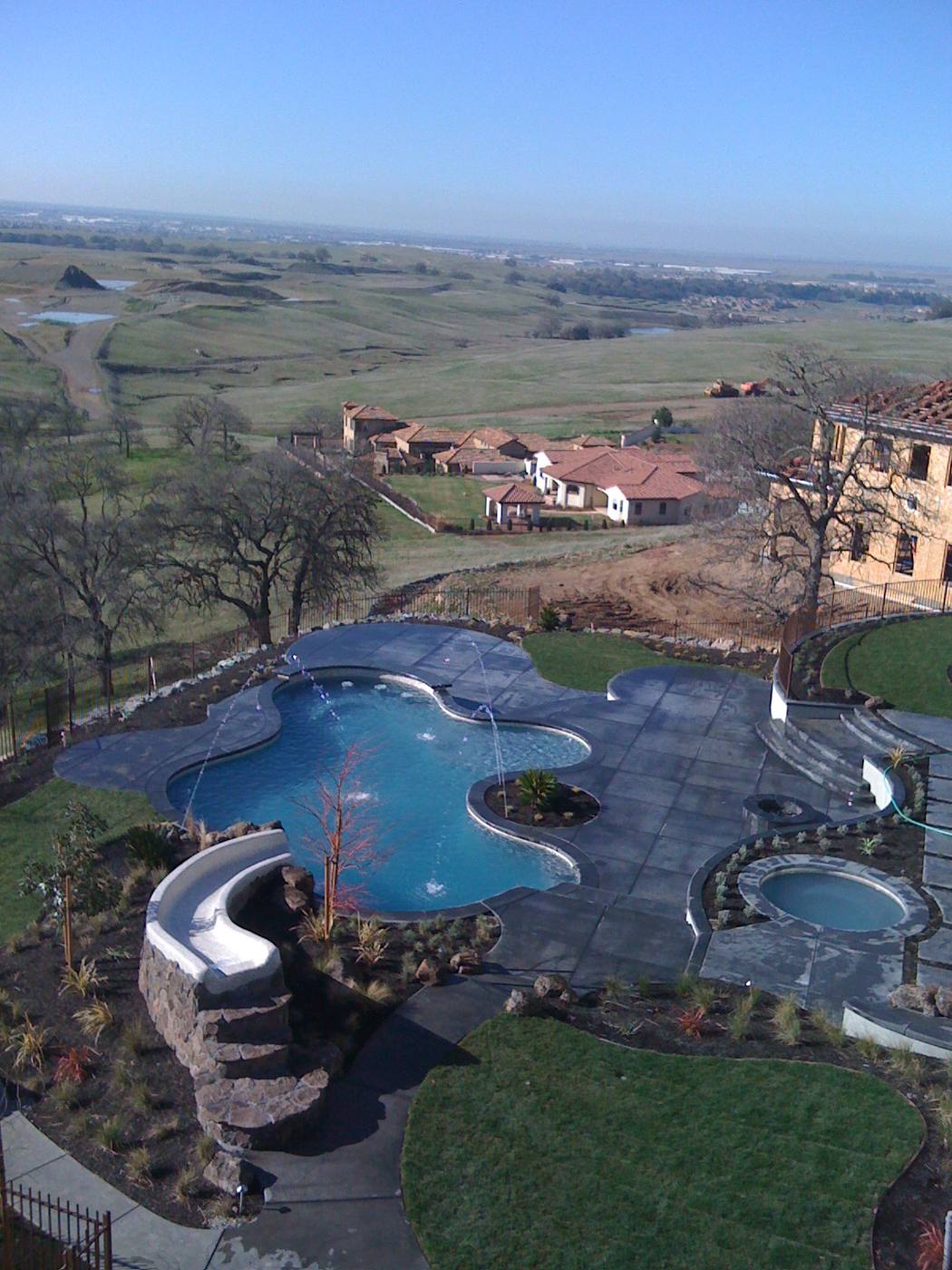 Complete outdoor living space design and build by Phenomenal Pool & Landscape