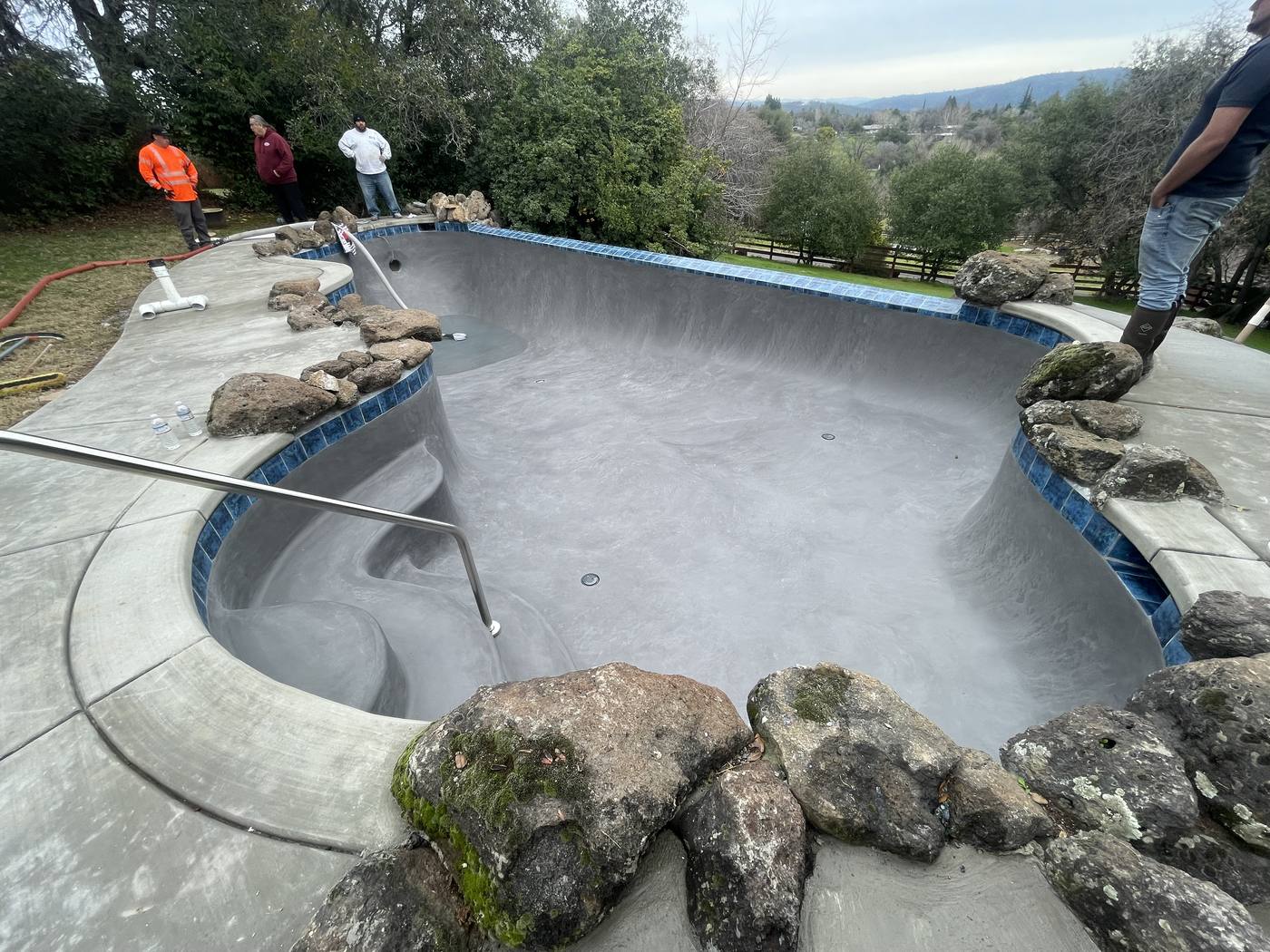 Pool after remodel — stunning new finish and updated design